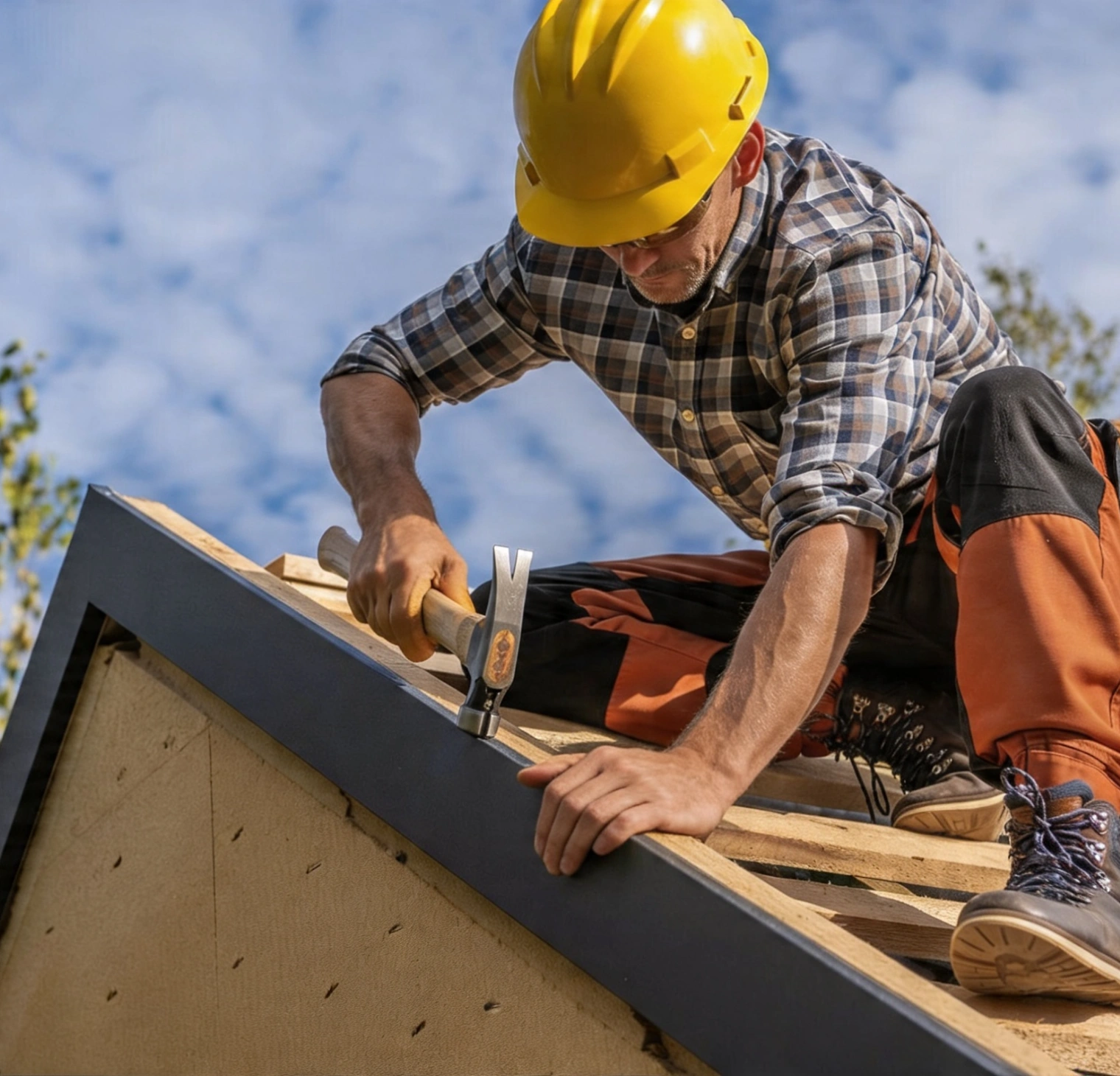 Roof installation service in Los Angeles with contractor hammering wooden roof frame